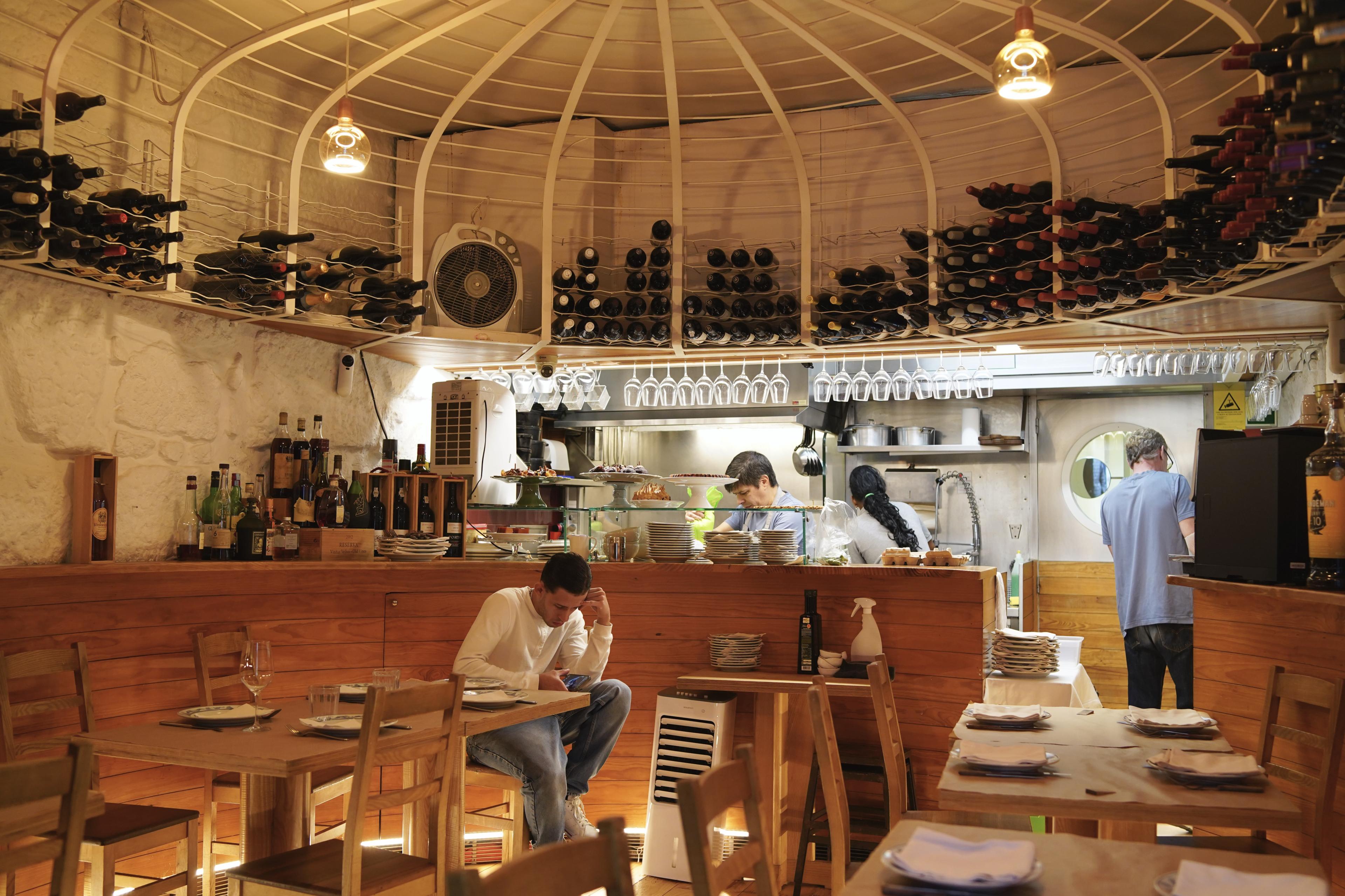 Traditional bacalhau à brás served in a rustic Porto tavern — authentic Portuguese dining